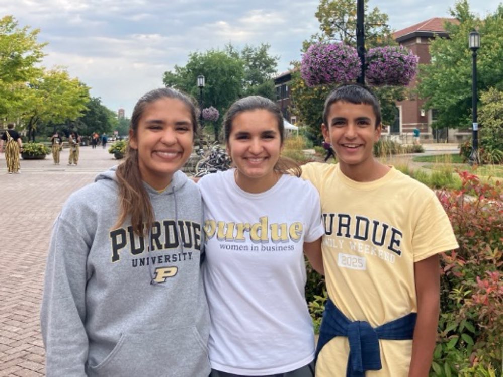 Anna, Naomi, and Josiah on the Purdue University campus in 2025